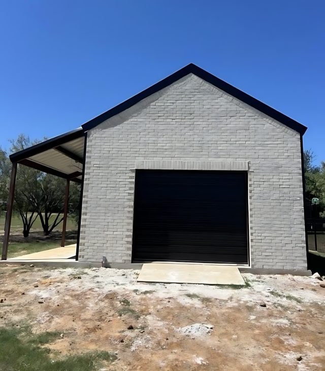 Burleson, TX — Metal Building with diving wall and spray foam, ac, electrical.